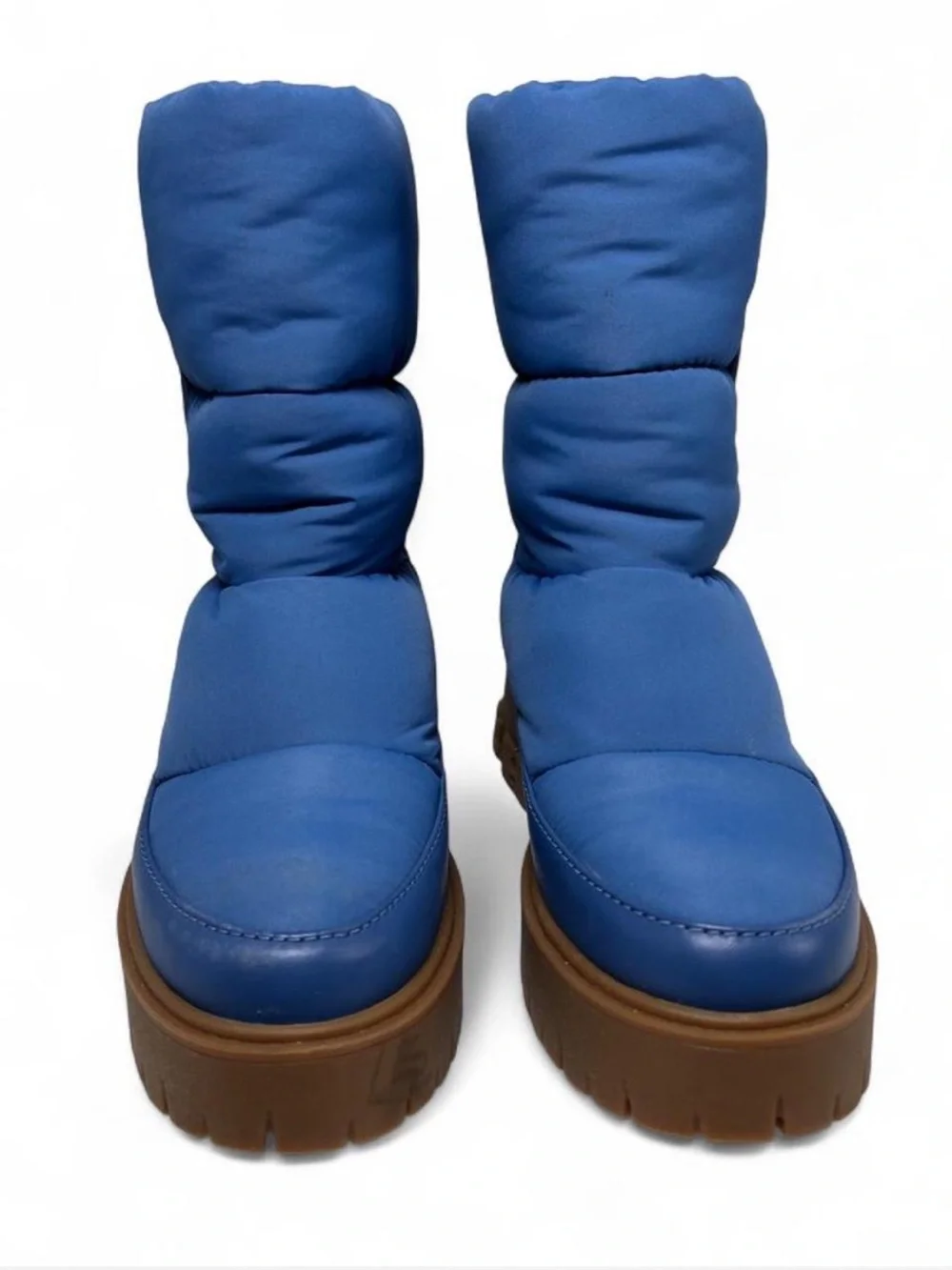 Coach Rya Boots inSky Blue. Quilted puffer-style nylon, leather upper.